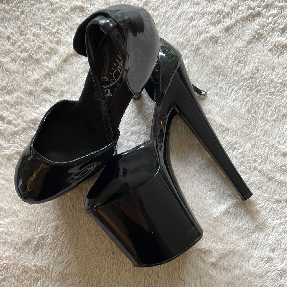 Black stiletto high heels.